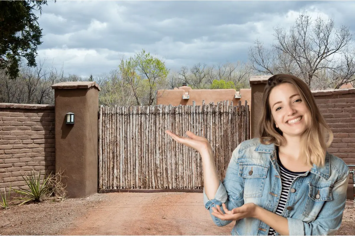 woman smilling while showing her cayote fencing