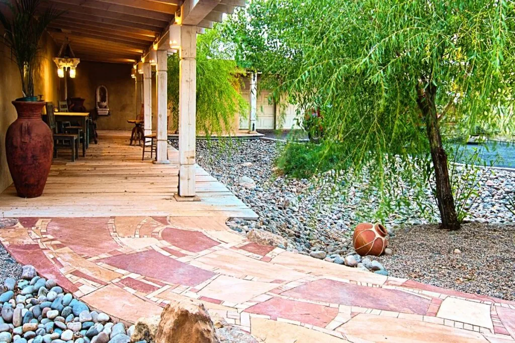 flagstone entrance path and porch with chairs